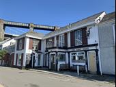 imposing waterside community pub