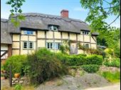 established cottage with separate