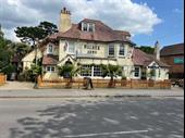large busy pub close