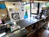 thriving dry cleaners launderette
