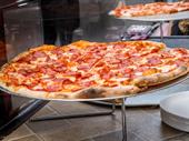 popular pizzeria busy strip