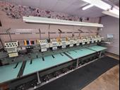 established 23 year embroidery