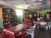 own a thriving restaurant