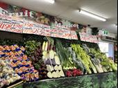busy fruit vegetable store