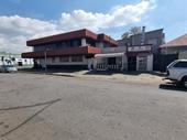 building plus vacant stand