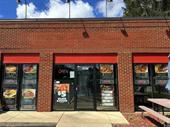 fully-equipped freestanding pizza place