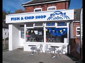 corner-built fish chip takeaway