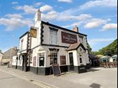 thriving community pub busy