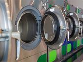 established semi-absentee card-operated laundromat
