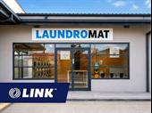 two self-service laundromats north-west